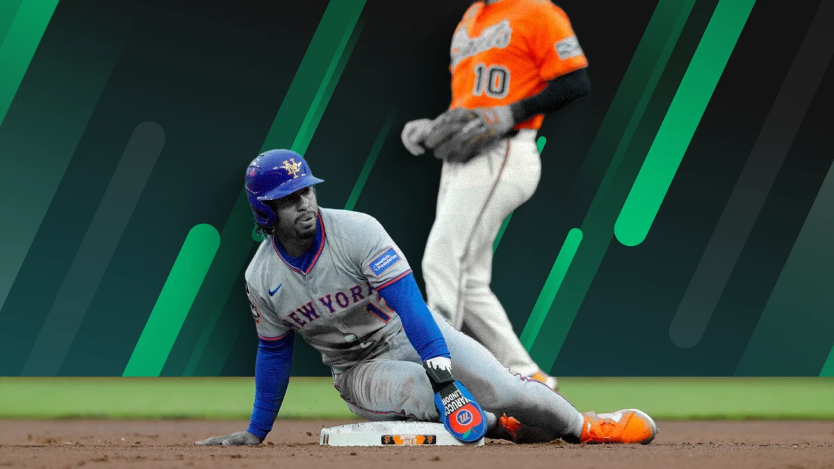 New York Mets player celebrates after sliding safely to base during a game against the San Francisco Giants